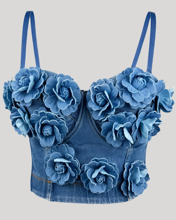 Front view of blue denim corset with 3D handmade flowers