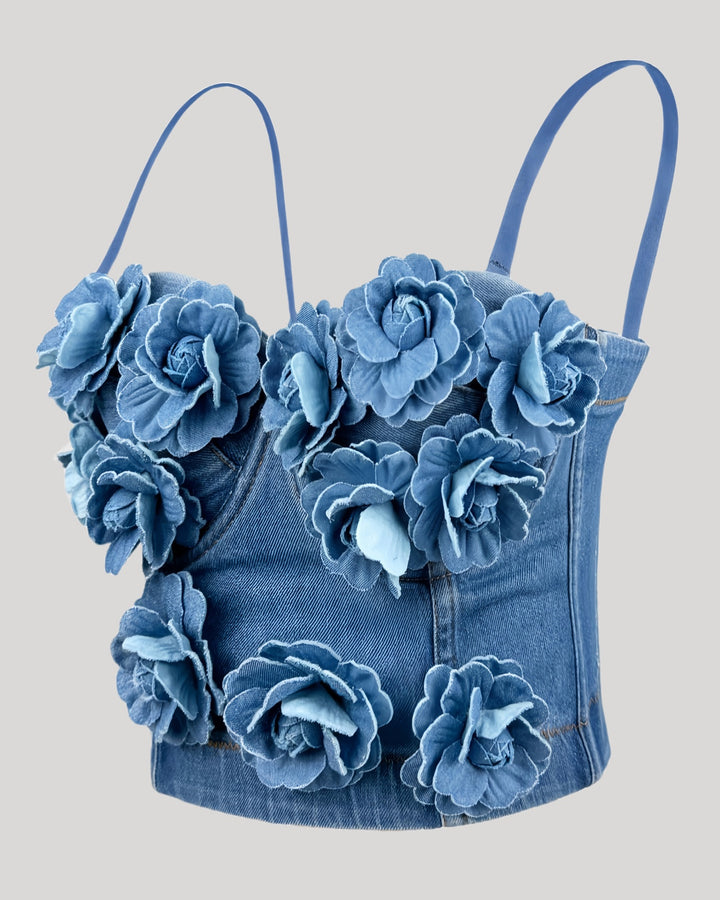 Side angle of blue floral corset showing bust detailing