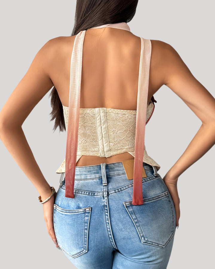 Back view of lace bustier with long ombré sash draping down