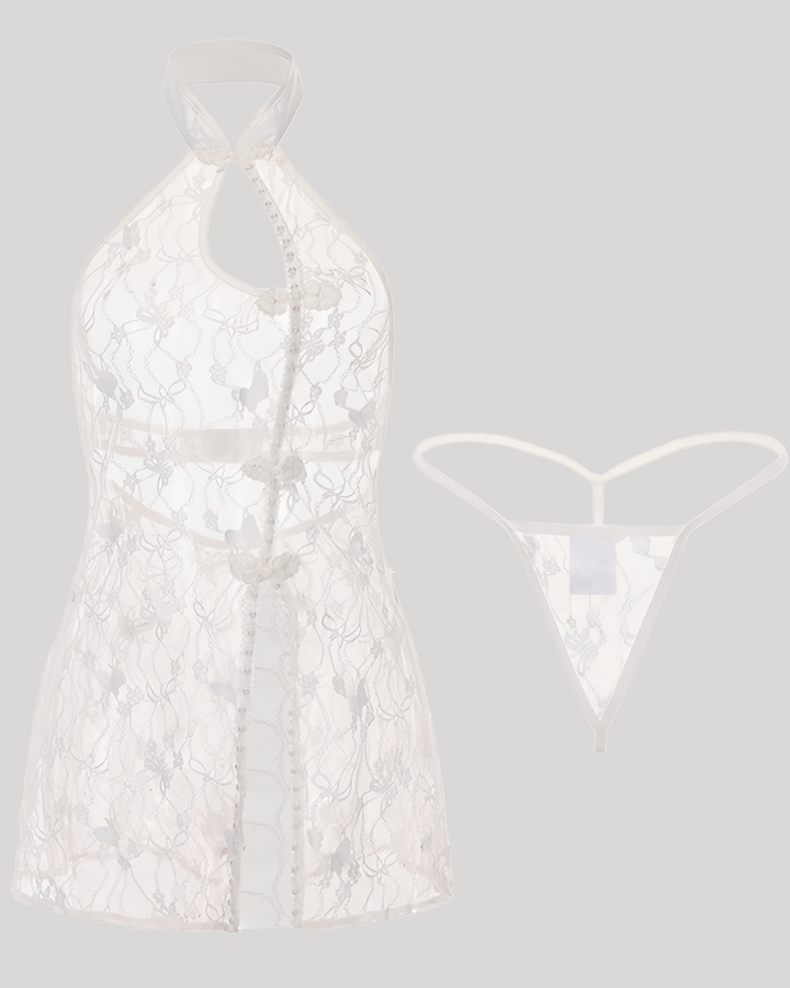 Flat lay of white embroidered halter lace bodysuit with matching thong