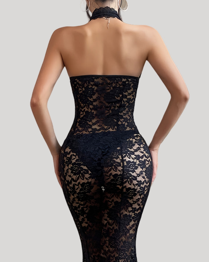 Back view of full-length bridal lace gown with open back design