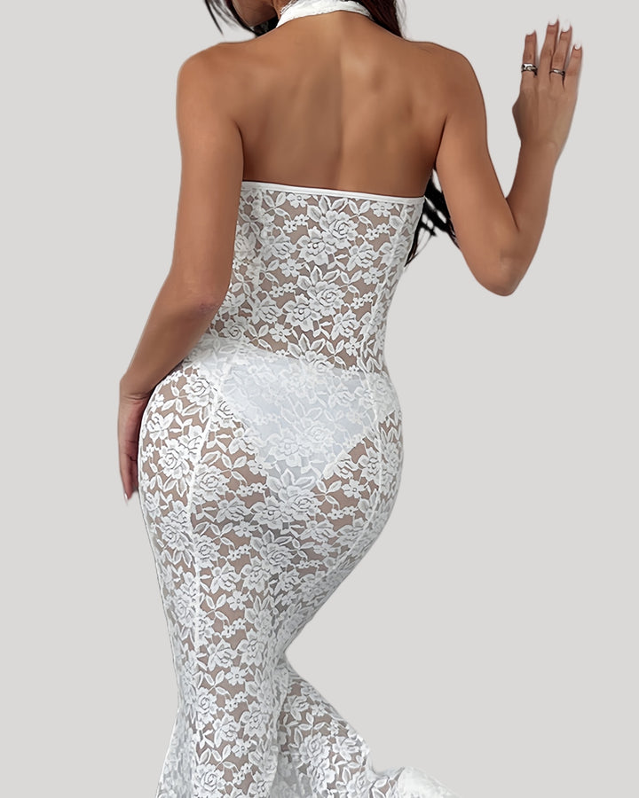 Back view of full-length bridal lace gown with open back design