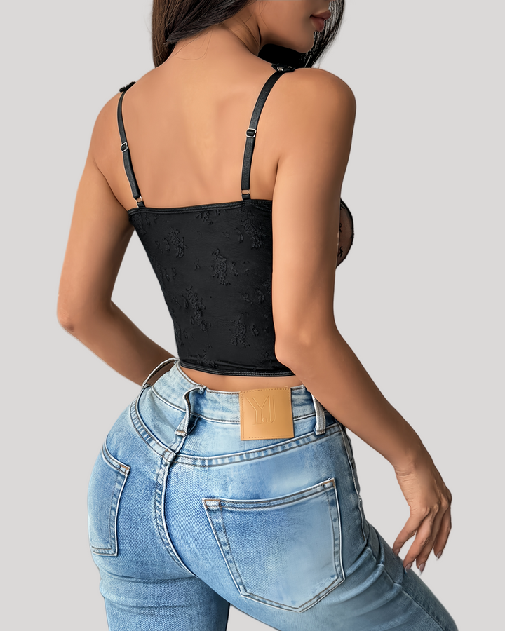 Rear view of black embroidered bustier with smooth mesh back