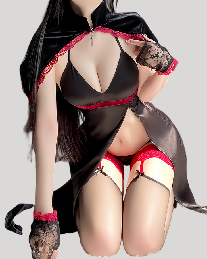 Model in high-slit black satin gown with red accents and horned headband