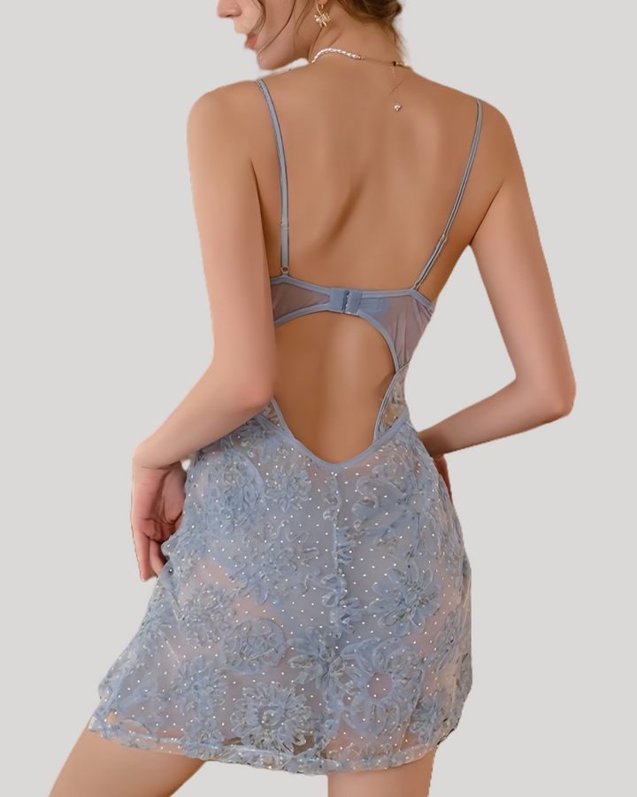 Back views of light blue embroidered babydoll nightdress with lace-up waist and floral details.