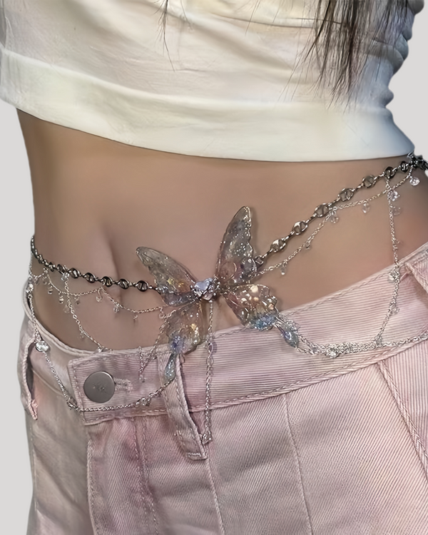 Pink butterfly crystal waist chain styled with pink jeans and crop top