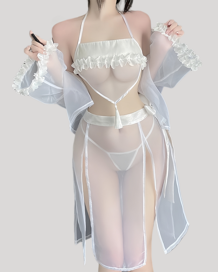 Model wearing sheer fantasy kimono lingerie set with ruffle bandeau and tassel waist strap