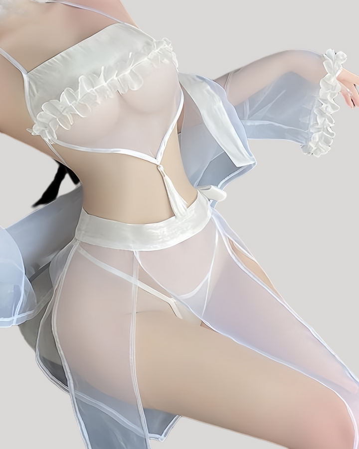 Model wearing sheer fantasy kimono lingerie set with ruffle bandeau and tassel waist strap