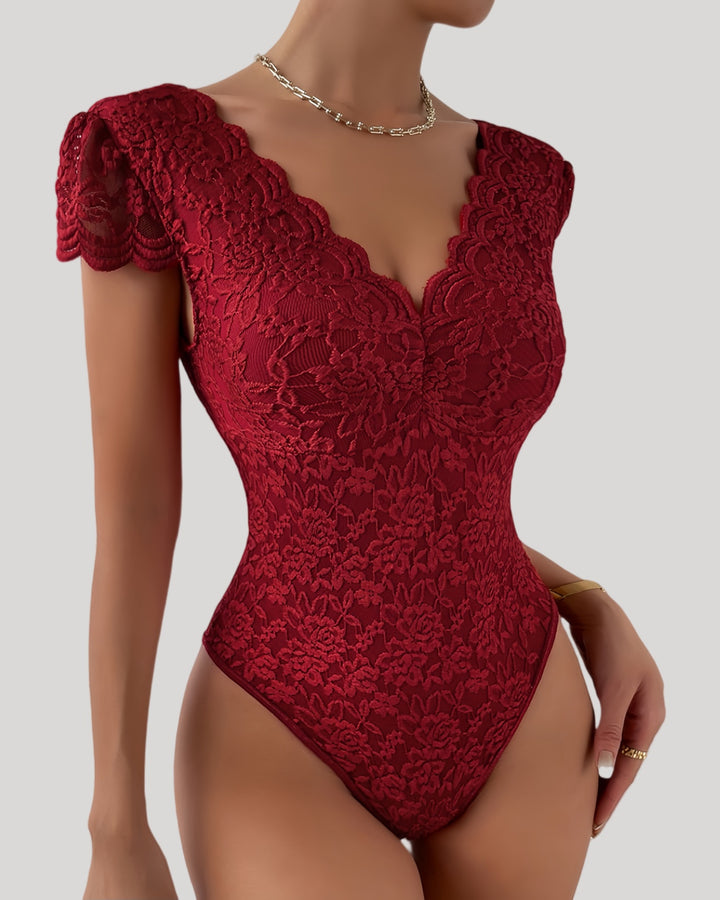 Wine red lace bodysuit highlighting deep V neckline and fitted shape