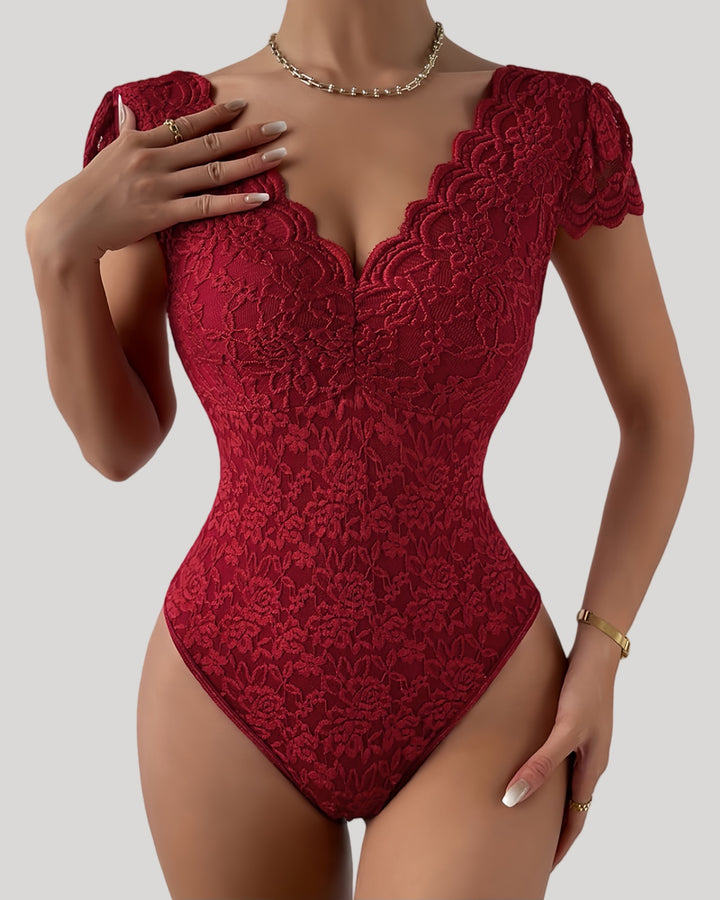 Wine red lace bodysuit highlighting deep V neckline and fitted shape