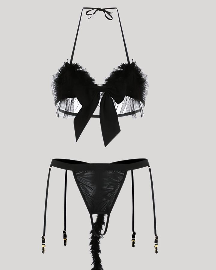 Flat lay of catgirl costume set including bra, thong, ears, choker, and cuffs