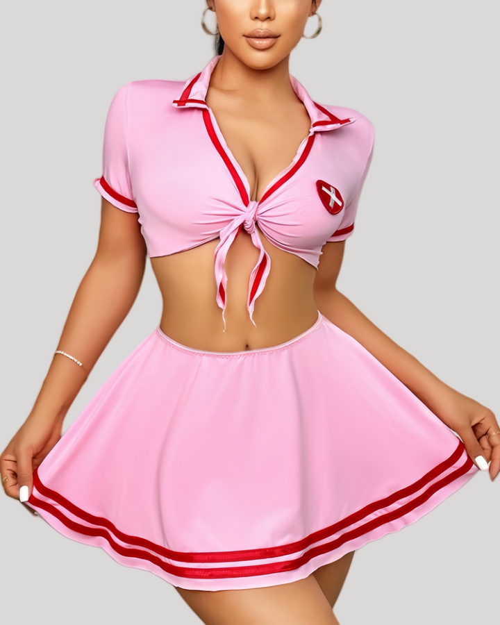 Pink variation of nurse costume set with cross emblem and cap