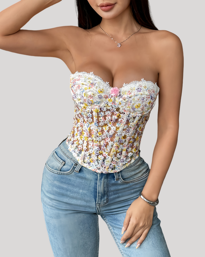 Strapless floral lace corset top with white mini skirt front view