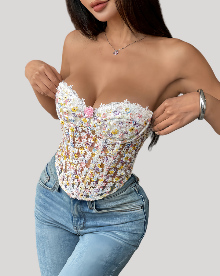 Strapless floral lace corset top with white mini skirt front view