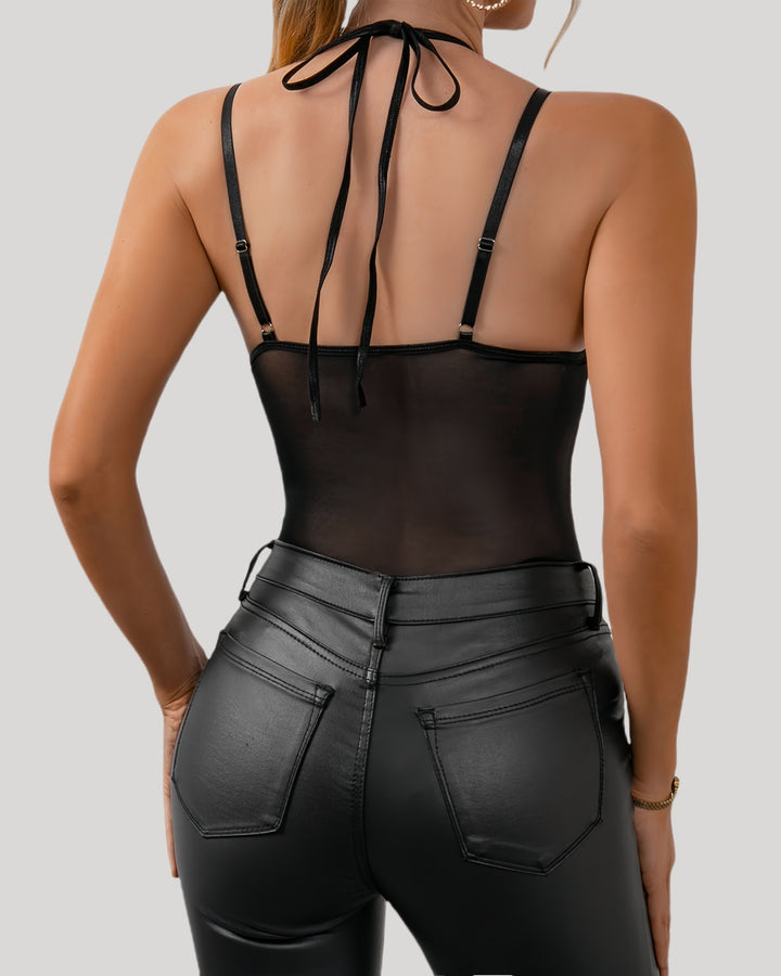 Back view of black mesh bodysuit with halter tie