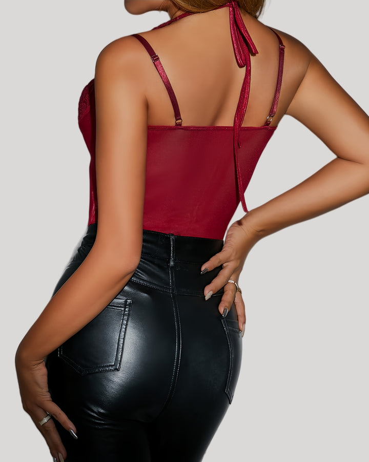 Back view of red mesh bodysuit with halter tie