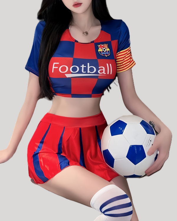 Model wearing red and blue football-themed crop top and pleated mini skirt