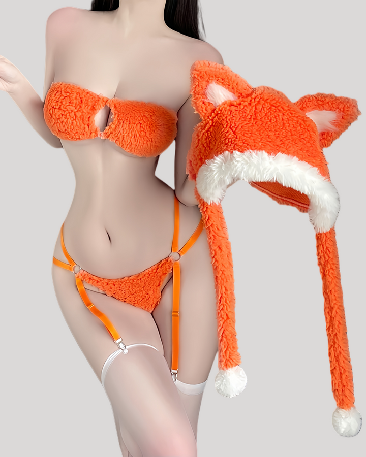 Model wearing fuzzy orange fox lingerie set with matching hood