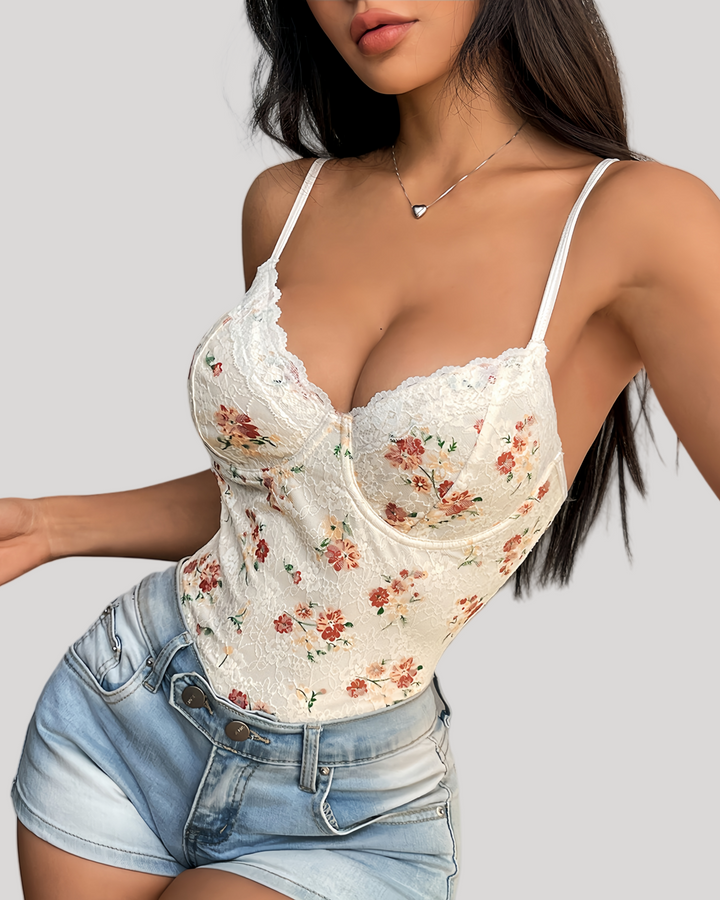 Model wearing floral lace bodysuit with underwire cups and white straps