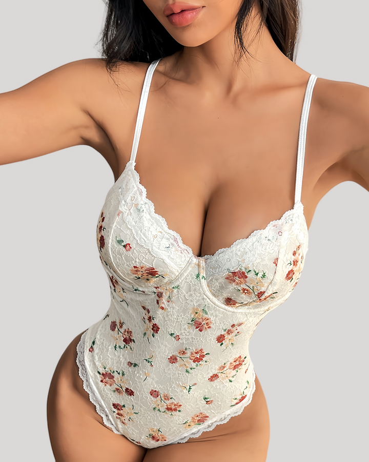 Model wearing floral lace bodysuit with underwire cups and white straps