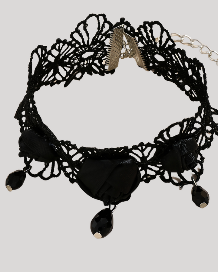 Close-up of gothic floral ankle bracelet 