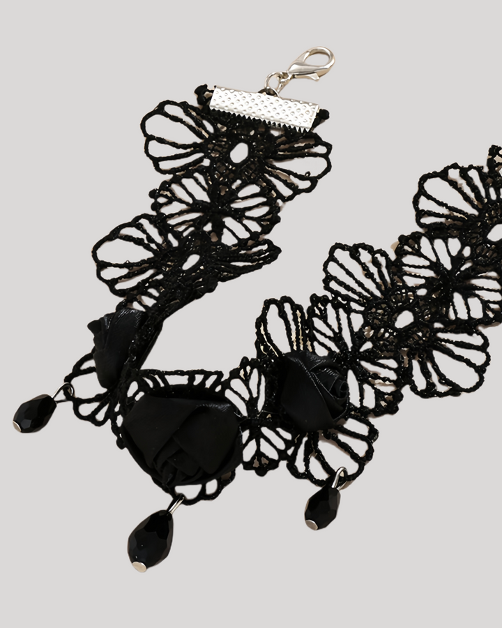 Laid-flat view of lace floral anklet with clasp chain