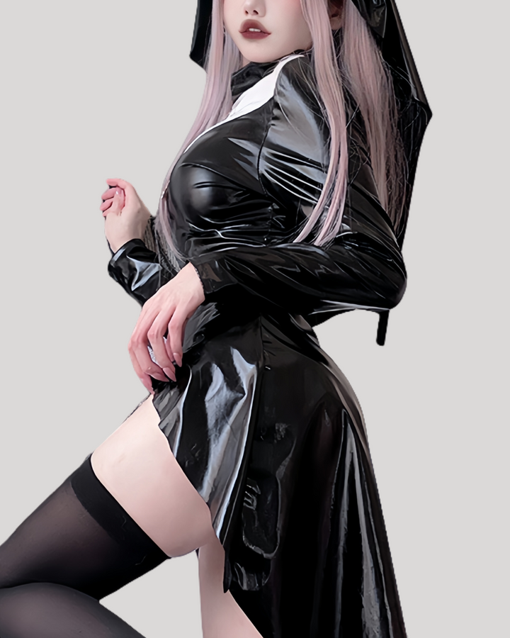 Side pose showing glossy black outfit and long leg line