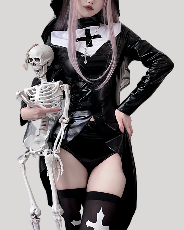 Model in black faux leather gothic nun costume with white cross details