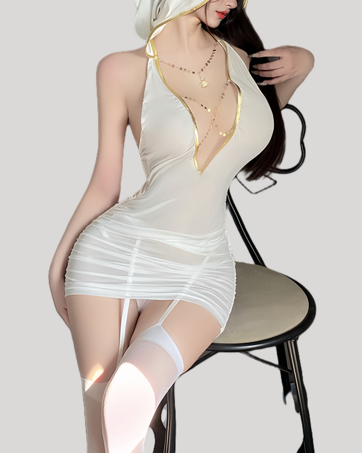Model in white hooded lingerie mini dress sitting