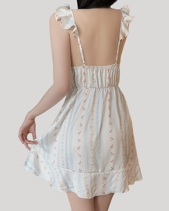 Back view of babydoll showing low open back with ruffled hem