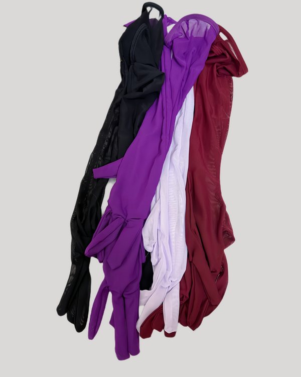 Four pairs of gloves in black, purple, white, and red on a gray background