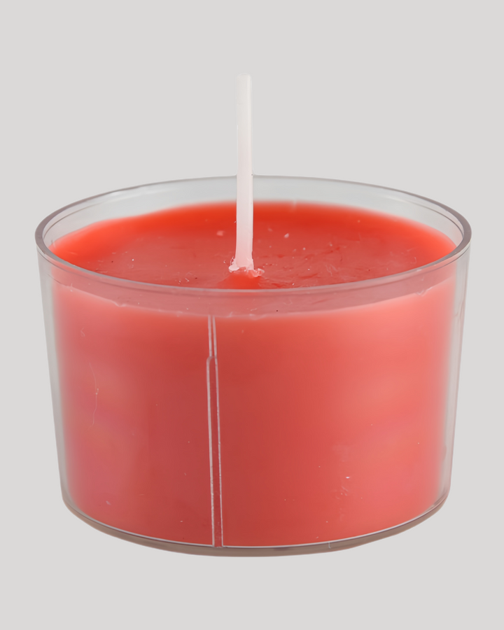 Red low-temperature sensual play candle in a clear cup
