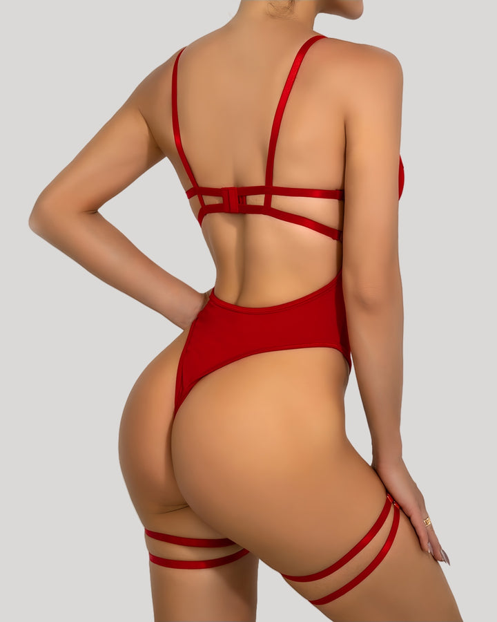 Back view of red bodysuit with cut-out strappy detail