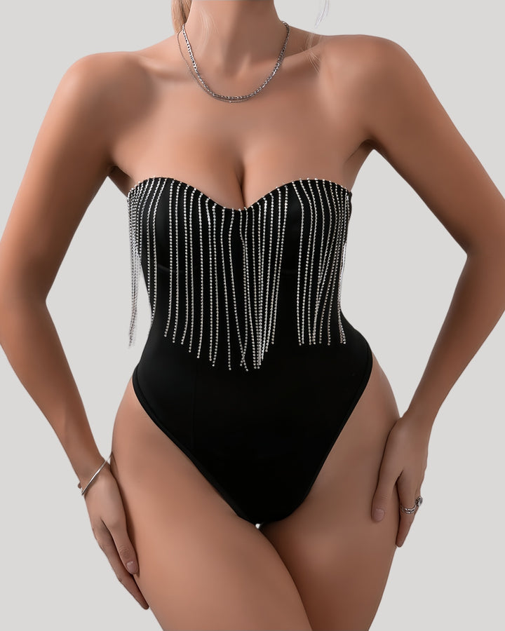 Front view of black strapless bodysuit with rhinestone fringe