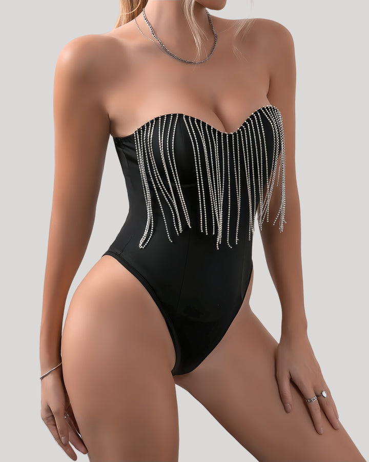 Front view of black strapless bodysuit with rhinestone fringe