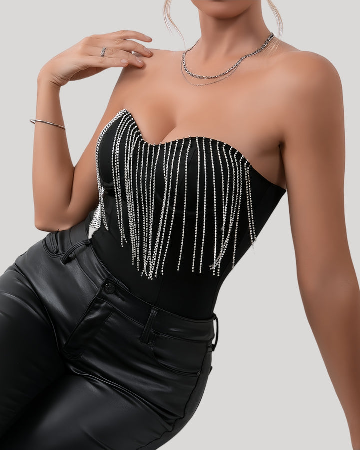 Front view of black strapless bodysuit with rhinestone fringe