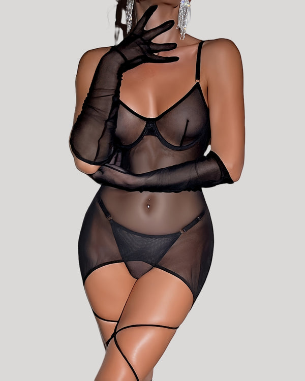 Model wearing black sheer backless mesh mini dress and matching gloves