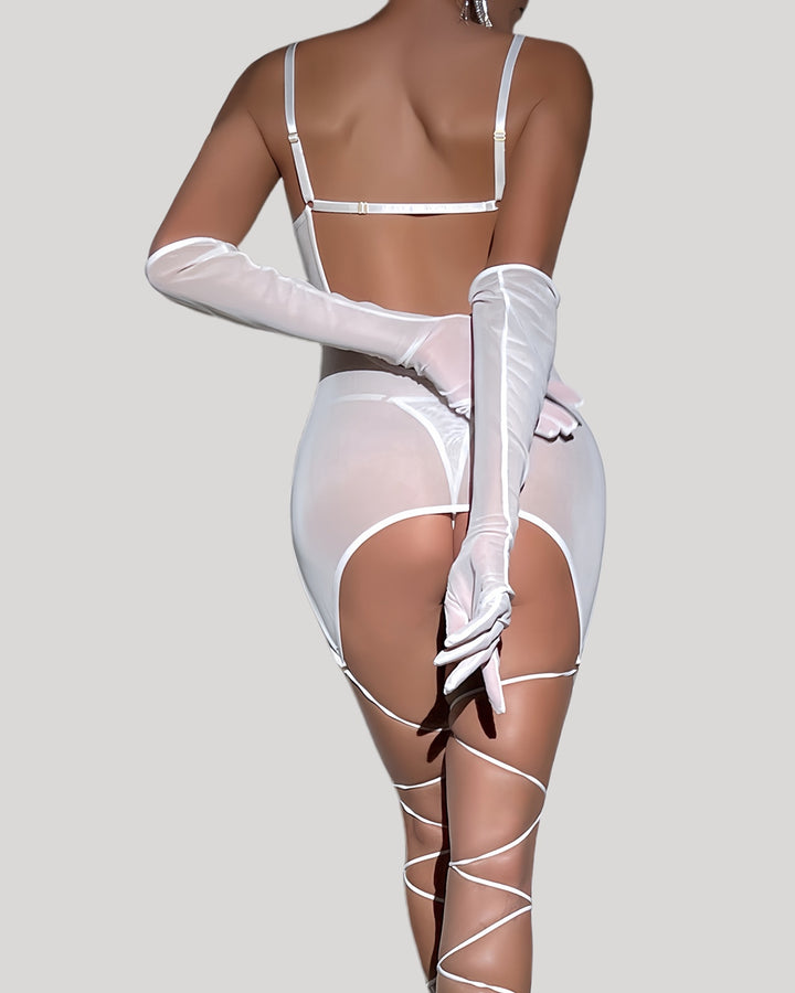 Back view of white mesh dress showing cut-out design