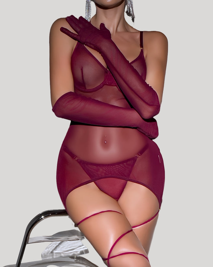 Model wearing red sheer backless mesh mini dress and matching gloves