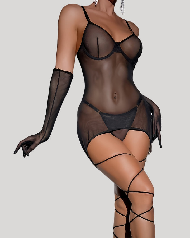 Model wearing black sheer backless mesh mini dress and matching gloves