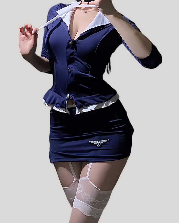 Model wearing navy flight attendant blazer top and mini skirt with white lace stockings