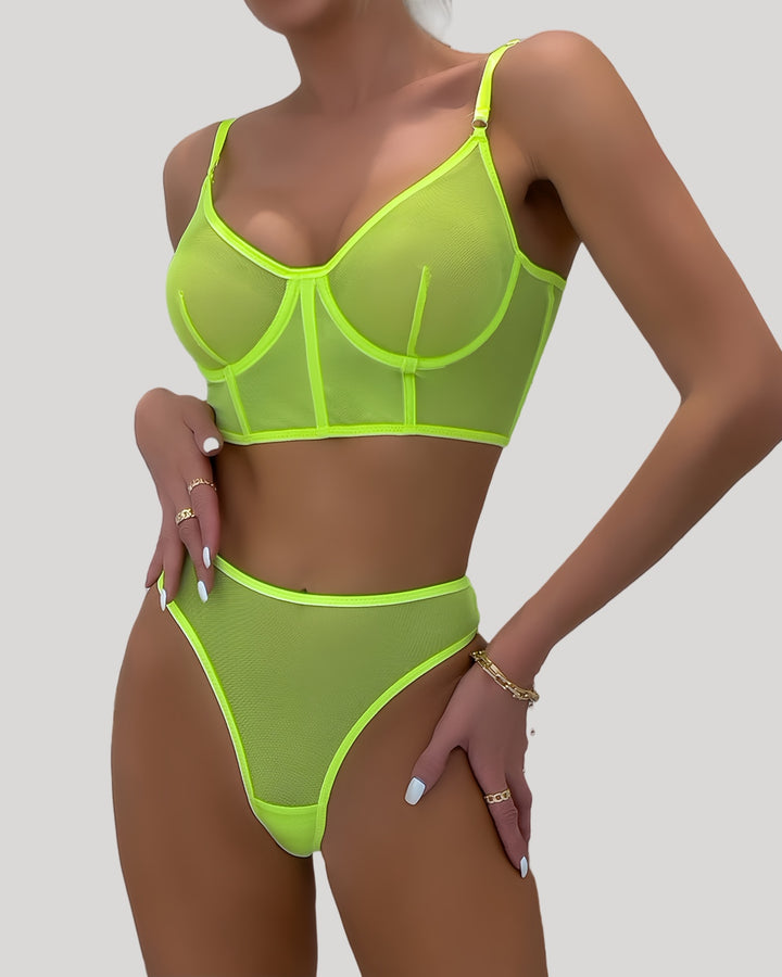 Front view of neon yellow sheer mesh lingerie set on model