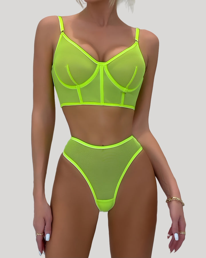 Front view of neon yellow sheer mesh lingerie set on model