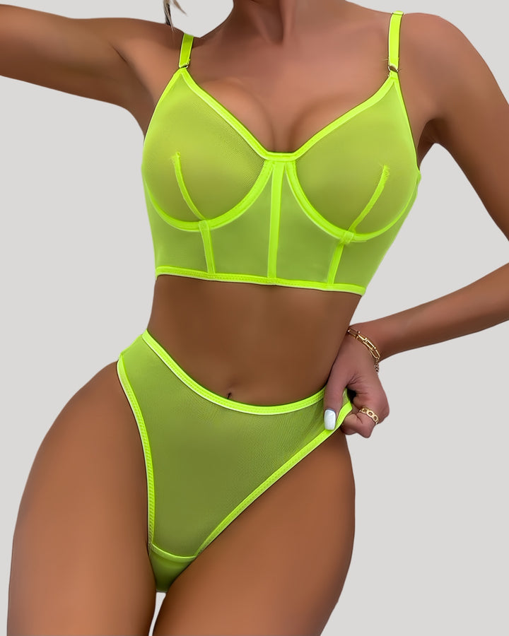 Front view of neon yellow sheer mesh lingerie set on model