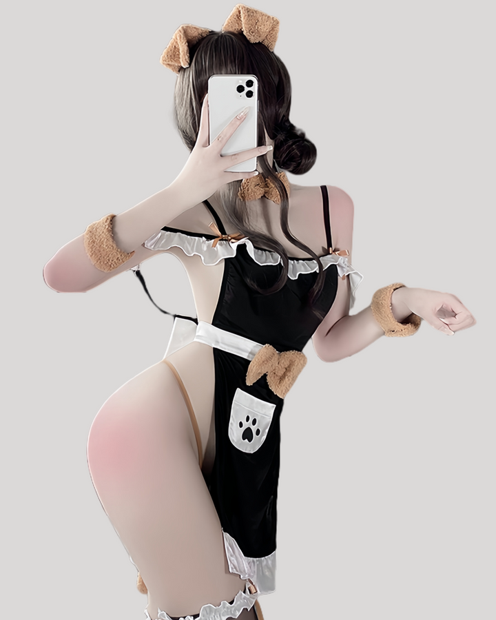 Model wearing lace dog maid costume with paw print apron and bow headband