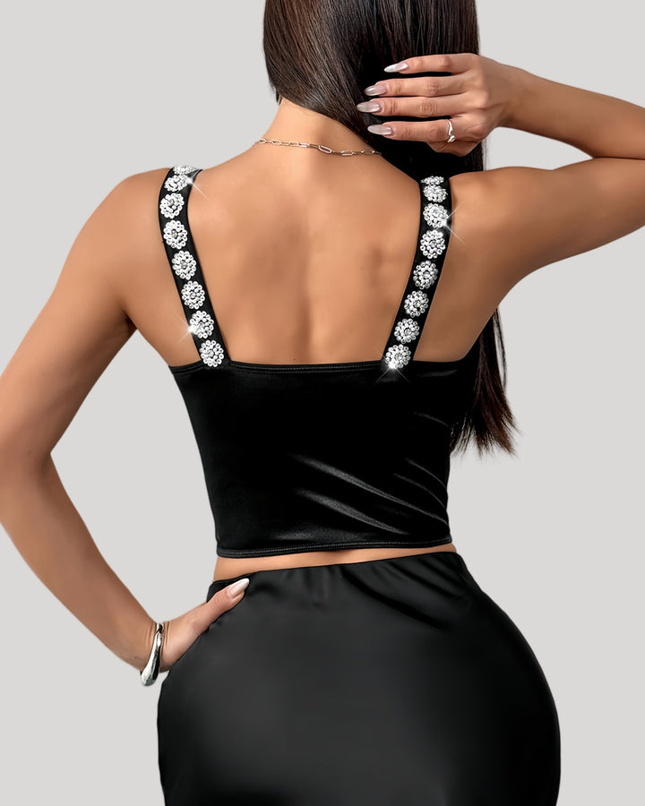 Back view of rhinestone strap bustier with smooth black back panel
