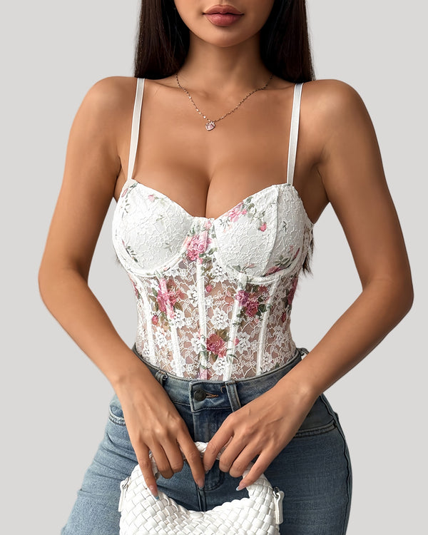 Model wearing floral lace bodysuit styled with jeans and purse