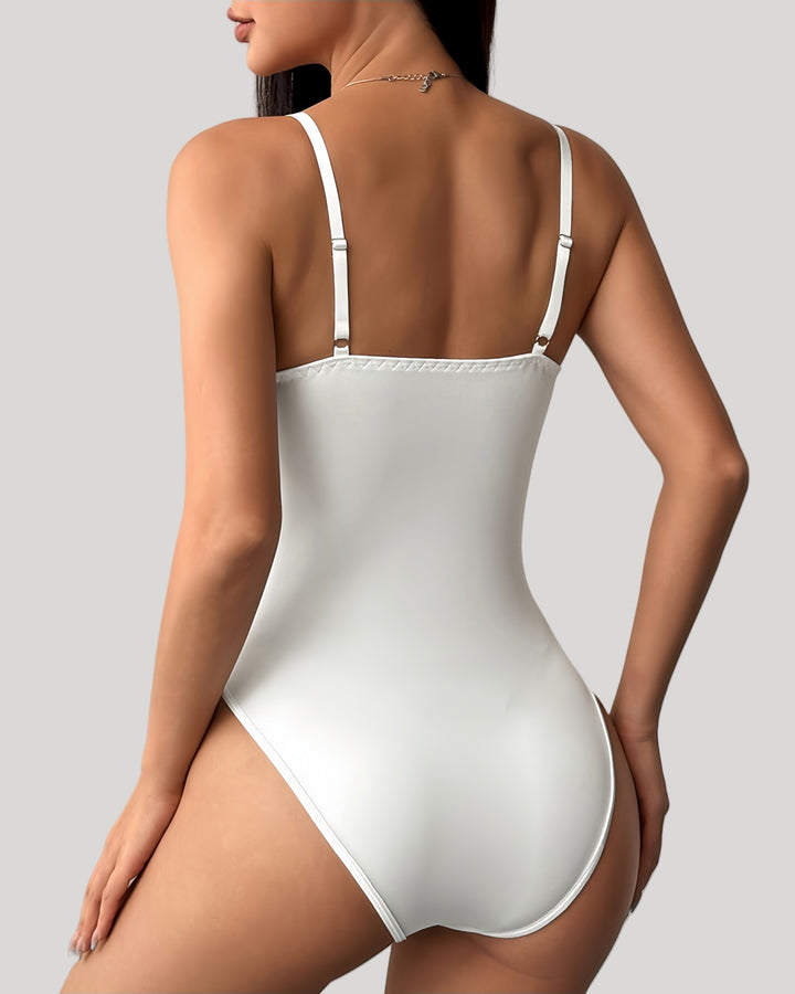 Back view of white bodysuit with smooth finish and adjustable straps