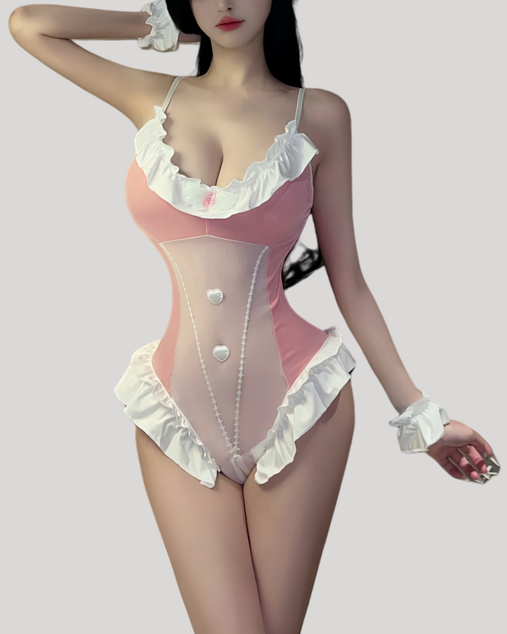 Model wearing a pink lace-trimmed bunny bodysuit with matching ears and wrist cuffs