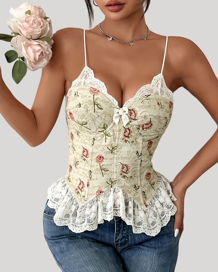 Woman wearing floral jacquard corset top with lace trim and bow accent